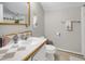Neutral bathroom with a single vanity and a combined shower and bathtub at 312 Green St, Sanford, NC 27330