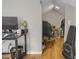 Bright room featuring hardwood floors, neutral walls, and a separate area for storage at 312 Green St, Sanford, NC 27330