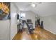 Spacious room with hardwood floors, a ceiling fan, and a separate area for storage at 312 Green St, Sanford, NC 27330