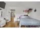 Bedroom with hardwood floors, neutral walls, and natural light at 312 Green St, Sanford, NC 27330