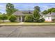 Charming single-story home with well-maintained landscaping and inviting curb appeal at 312 Green St, Sanford, NC 27330
