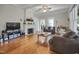 Bright living room with hardwood floors, fireplace, and stylish furnishings at 312 Green St, Sanford, NC 27330