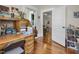 Bright office space with hardwood floors, lots of light, and a built-in desk and shelving at 312 Green St, Sanford, NC 27330