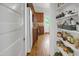 Walk-in pantry with white shelves offering ample storage space for food and supplies at 312 Green St, Sanford, NC 27330