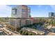 Aerial view of building complex showing surrounding buildings, parking, and urban environment at 320 W Martin St # 205, Raleigh, NC 27601