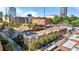 City view showing the building's exterior with surrounding buildings on a clear, sunny day at 320 W Martin St # 205, Raleigh, NC 27601
