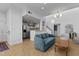 Open-concept living area features a modern kitchen and stylish living space at 320 W Martin St # 205, Raleigh, NC 27601