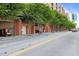 Exterior street view of building with parking garage at 320 W Martin St # 205, Raleigh, NC 27601