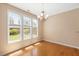Comfortable dining area with natural light and hardwood floors, perfect for Gathering meals at 3566 Sunbright Ln, Raleigh, NC 27610