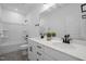 Bright bathroom with a double vanity, a shower and bathtub combo, and a toilet at 386 The Parks Dr, Pittsboro, NC 27312