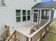 Wooden patio with chairs and outdoor seating; great spot to relax and enjoy at 386 The Parks Dr, Pittsboro, NC 27312