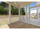 Beautiful screened in porch with plenty of room, and views of the backyard at 386 The Parks Dr, Pittsboro, NC 27312