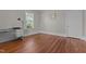 Bright bedroom with hardwood floors, a built-in desk and a window with natural light at 404 W E St, Erwin, NC 28339
