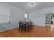 Dining area featuring a wood table and chairs and natural light at 404 W E St, Erwin, NC 28339