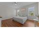 Bedroom featuring wood floors, natural light, and a cozy atmosphere at 404 W E St, Erwin, NC 28339