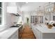 Gourmet kitchen boasts stainless appliances, large island, and hardwood floors at 4404 Yadkin Dr, Raleigh, NC 27609