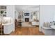 Beautiful view into an inviting living room from an adjacent room with hardwood floors and white accents at 4404 Yadkin Dr, Raleigh, NC 27609