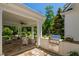 Covered outdoor kitchen with grill and stone flooring at 4404 Yadkin Dr, Raleigh, NC 27609