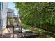 Back yard featuring a deck with stairs and a garden at 4725 Parr Vista Ct, Raleigh, NC 27612