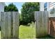 Back yard features a wooden fence and small garden at 4725 Parr Vista Ct, Raleigh, NC 27612
