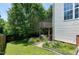 Back yard features a small garden and deck at 4725 Parr Vista Ct, Raleigh, NC 27612