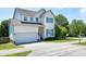 Inviting two-story home with a two-car garage and well-maintained lawn for excellent curb appeal at 4725 Parr Vista Ct, Raleigh, NC 27612