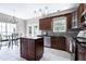 Well-equipped kitchen featuring granite countertops, stainless steel appliances, and a center island at 4725 Parr Vista Ct, Raleigh, NC 27612
