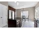 Bright kitchen with tile floors, a center island, stainless steel appliances and an adjacent breakfast nook at 4725 Parr Vista Ct, Raleigh, NC 27612