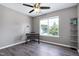 Office space featuring a window, desk, and hardwood floors at 4725 Parr Vista Ct, Raleigh, NC 27612