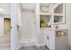 Bathroom featuring a walk-in shower and built-in shelves for storage at 4901 Old Elizabeth Rd, Raleigh, NC 27616