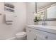 Cozy half bathroom showcases stylish decor, white vanity, and modern fixtures offering convenience and charm at 4901 Old Elizabeth Rd, Raleigh, NC 27616