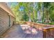Wooden deck surrounded by lush greenery, perfect for outdoor enjoyment at 4901 Old Elizabeth Rd, Raleigh, NC 27616