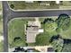 Aerial view of property on a corner lot featuring a well-maintained lawn and mature trees at 4908 Mandel Rd, Durham, NC 27712