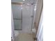 Bathroom featuring a shower with a glass door and grab bar at 4908 Mandel Rd, Durham, NC 27712