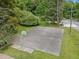 Overhead shot of the community basketball court surrounded by trees and greenery at 500 Umstead Dr # 103C, Chapel Hill, NC 27516
