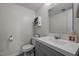 Well-organized bathroom with a storage shelf and sleek fixtures, providing a clean and functional space at 500 Umstead Dr # 103C, Chapel Hill, NC 27516