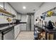 Well-lit kitchen featuring stainless steel appliances and ample storage at 500 Umstead Dr # 103C, Chapel Hill, NC 27516