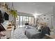 Comfortable living room featuring a large sectional sofa and sliding glass doors to the outside at 500 Umstead Dr # 103C, Chapel Hill, NC 27516