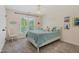 Cozy bedroom with plush carpet, lots of natural light, and a ceiling fan at 6 Gasper Ct, Durham, NC 27713