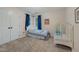 Bedroom with carpet, window, and blue curtain at 6 Gasper Ct, Durham, NC 27713