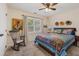 Bedroom with a rocker chair, a ceiling fan and window with lots of natural light at 6 Gasper Ct, Durham, NC 27713