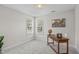 This bedroom is filled with natural light from two windows and features a desk at 6002 Whisperwood Dr, Durham, NC 27713