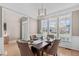 Dining room with hardwood floors, natural light and views of the neighborhood at 6002 Whisperwood Dr, Durham, NC 27713