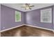 This naturally lit bedroom is equipped with wood floor and a view at 644 Angelica Cir, Cary, NC 27518