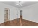 Bedroom features include hardwood floors, closet, and an ensuite bathroom, creating a cozy retreat at 644 Angelica Cir, Cary, NC 27518