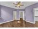 This spacious bedroom offers wood floors and an easy access to the walk-in closet at 644 Angelica Cir, Cary, NC 27518