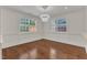 Bright dining area with white trim and molding, hardwood floors, and large windows with modern lighting at 644 Angelica Cir, Cary, NC 27518