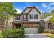 Charming two-story home with stone accents, manicured landscaping, and a two-car garage at 644 Angelica Cir, Cary, NC 27518