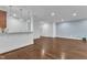 Open-concept living room with hardwood floors, bright lighting, and neutral paint colors, ready for customization at 644 Angelica Cir, Cary, NC 27518