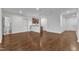 Open concept living space with hardwood floors, a kitchenette, and a nearby bathroom at 644 Angelica Cir, Cary, NC 27518